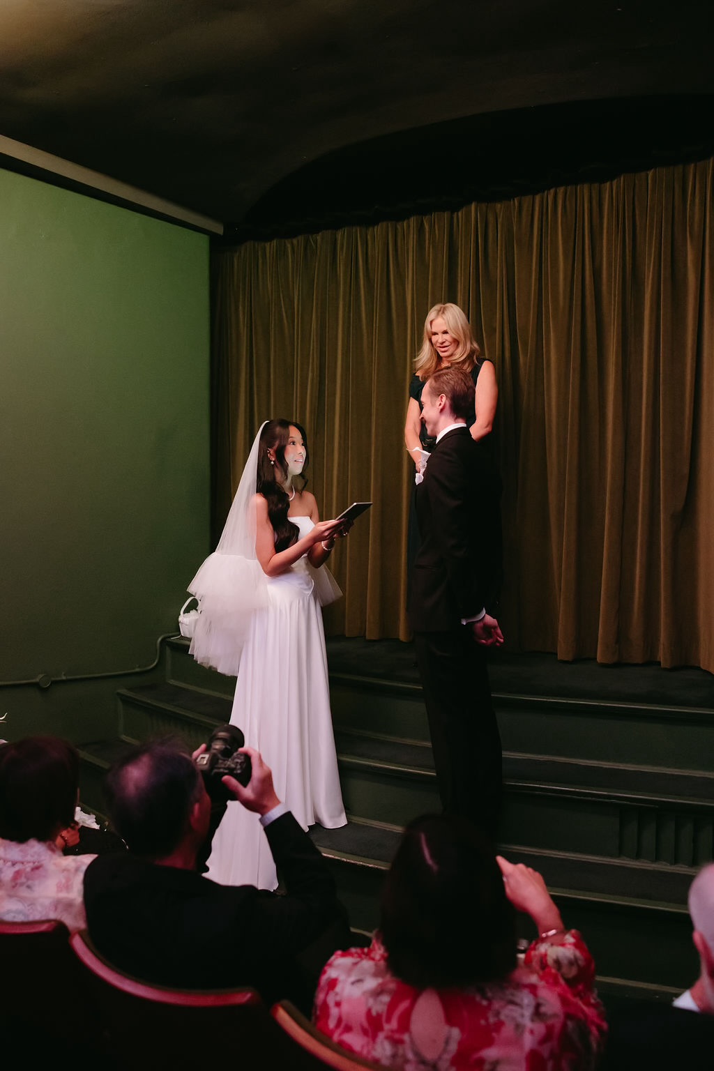 Exchanging vows on the theatre stage