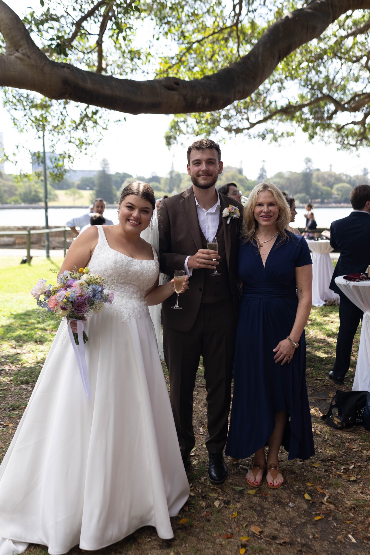 A family portrait beneath the harbourside fig tree