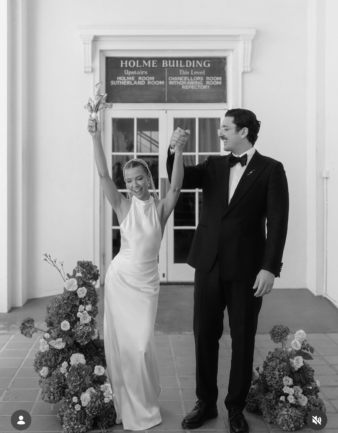 Hands raised in celebration, just married